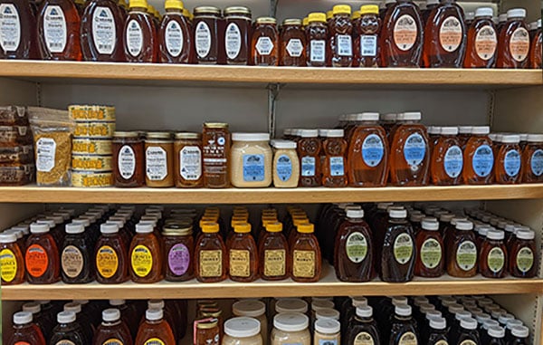 What is honey? Various forms and type so of honey on store shelves.
